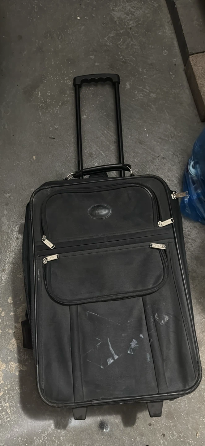 Black Carry And n Suitcase
