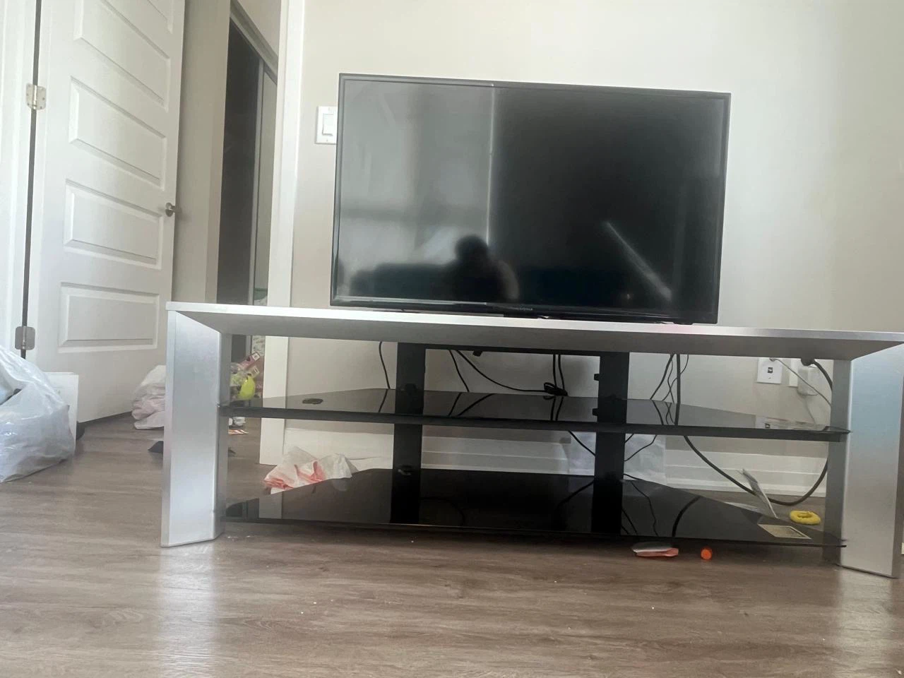 Modern Silver and Black Glass TV Stand with TV - photo 2