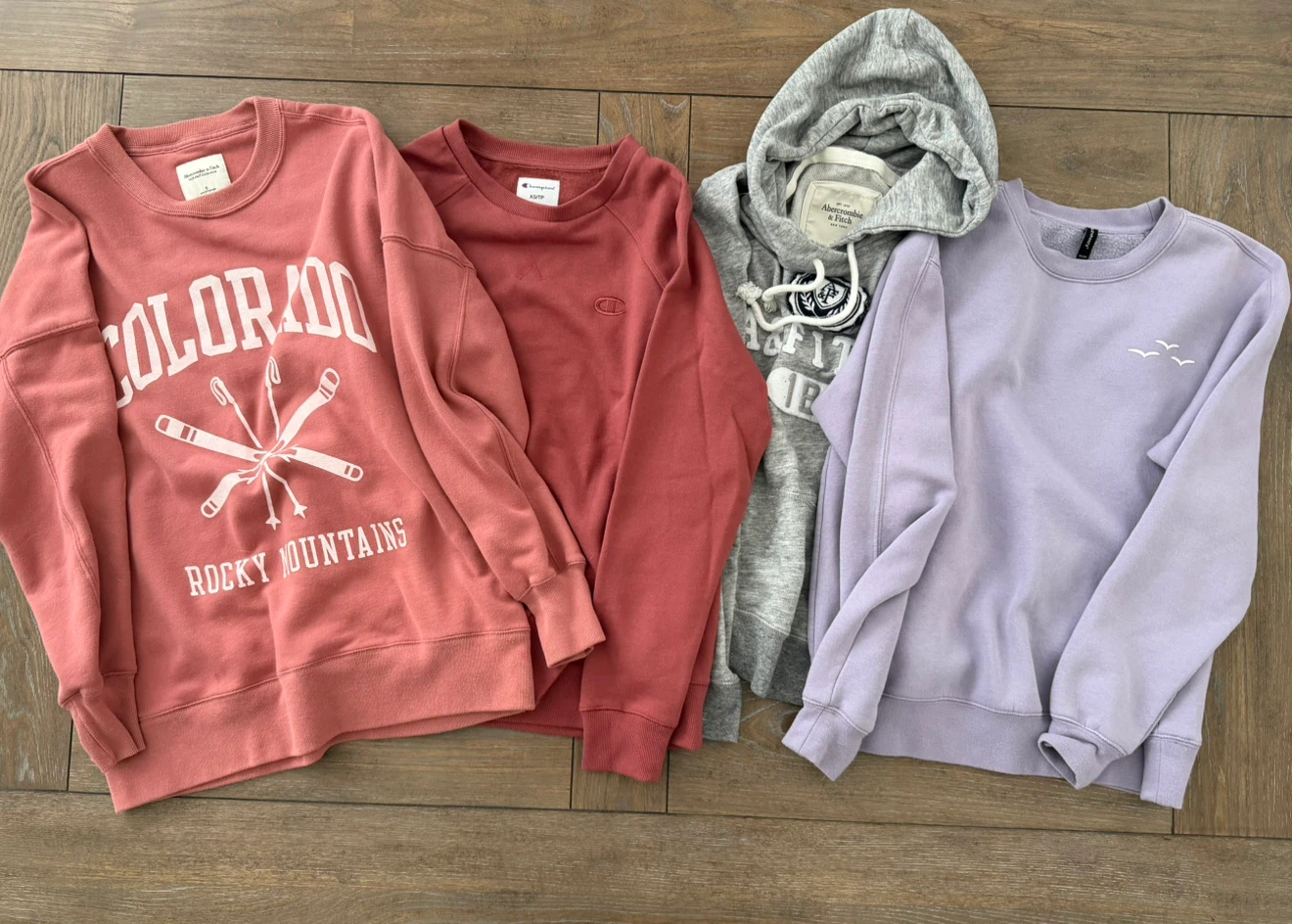Lot of 4 assorted sweaters and hoodies bundle