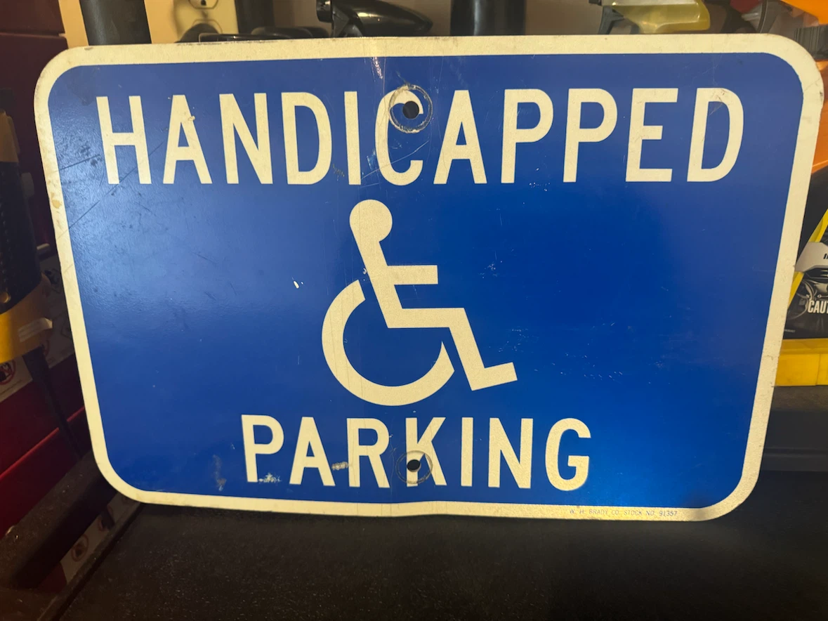 Metal Handicap Parking Sign.