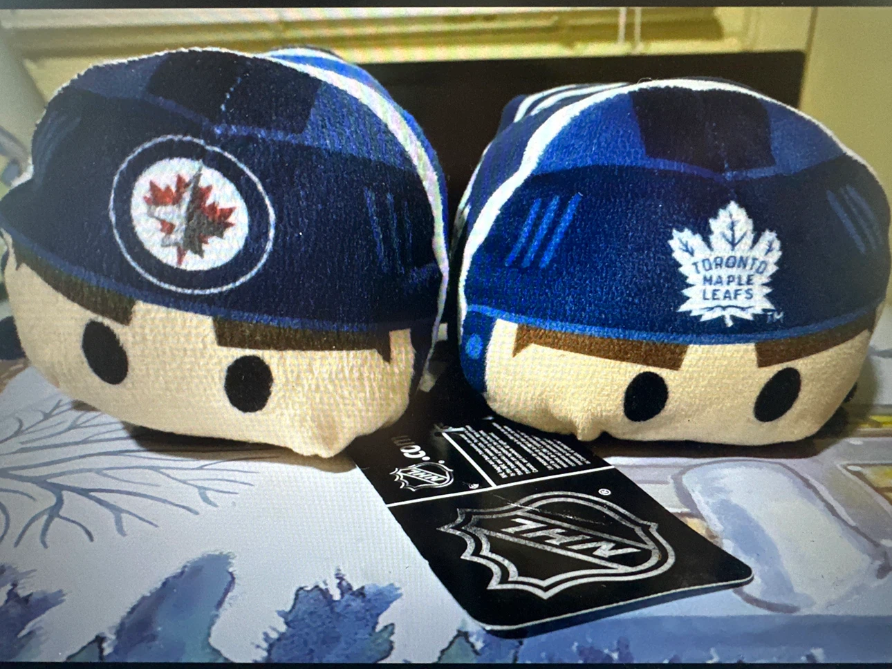 NHL Jets and Maple Leafs plush toys