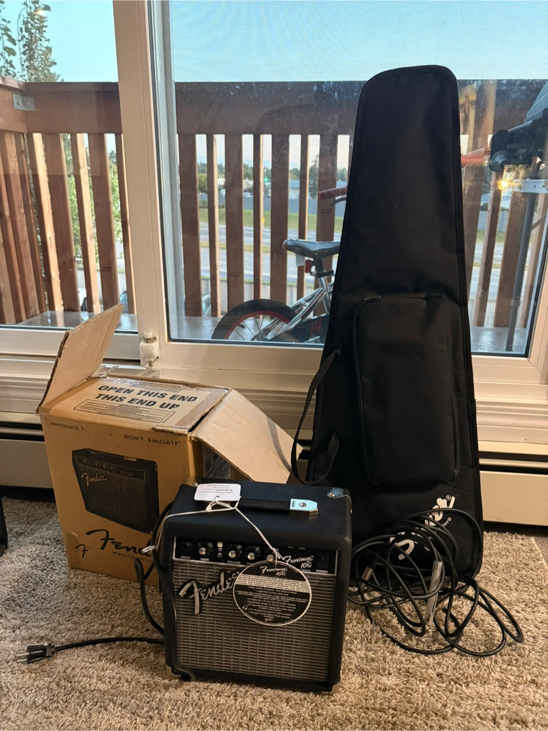 Squier Mini Electric Guitar and Fender Frontman 10G Amp