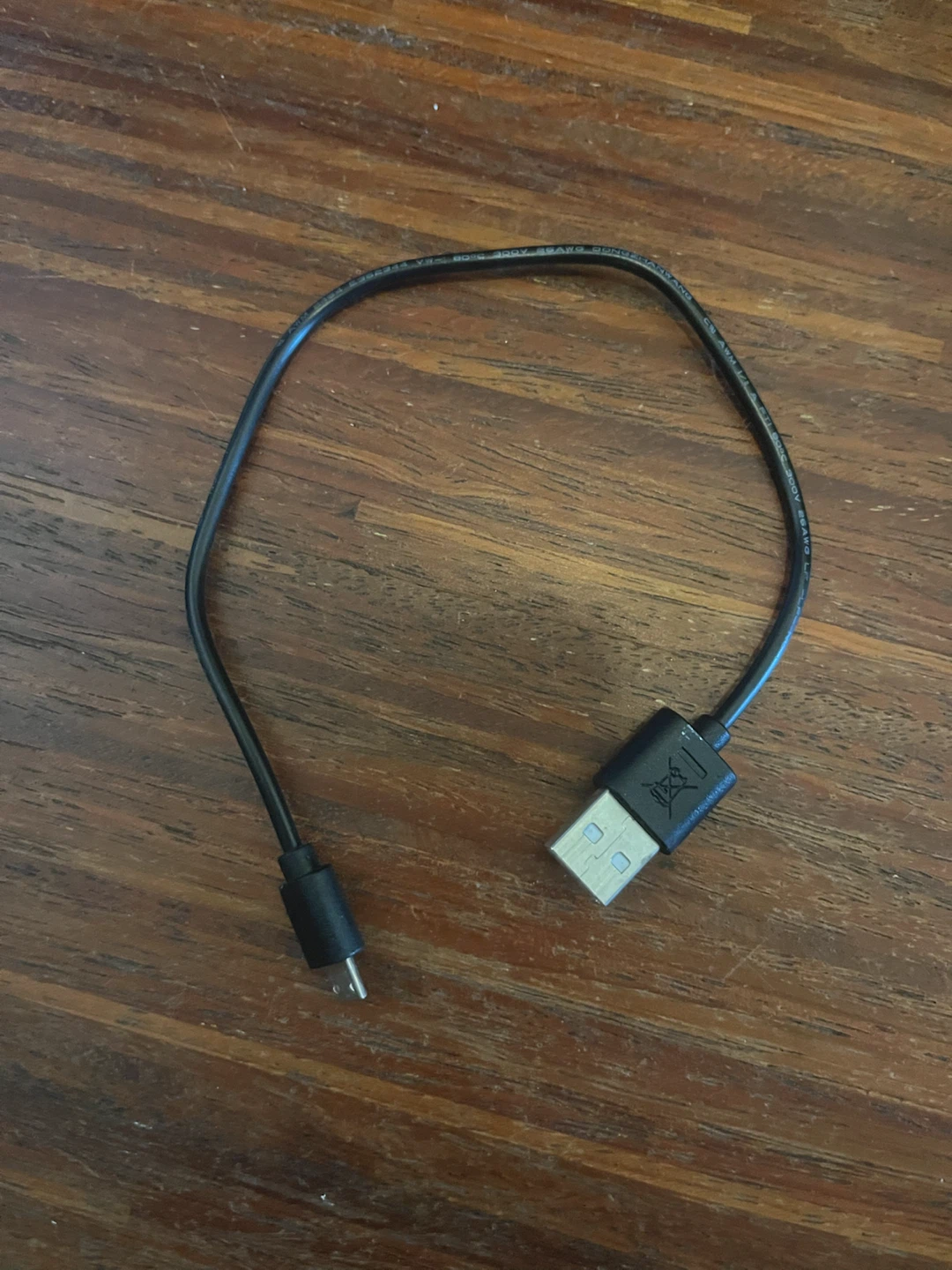 Black USB-A to Micro-USB charging cable