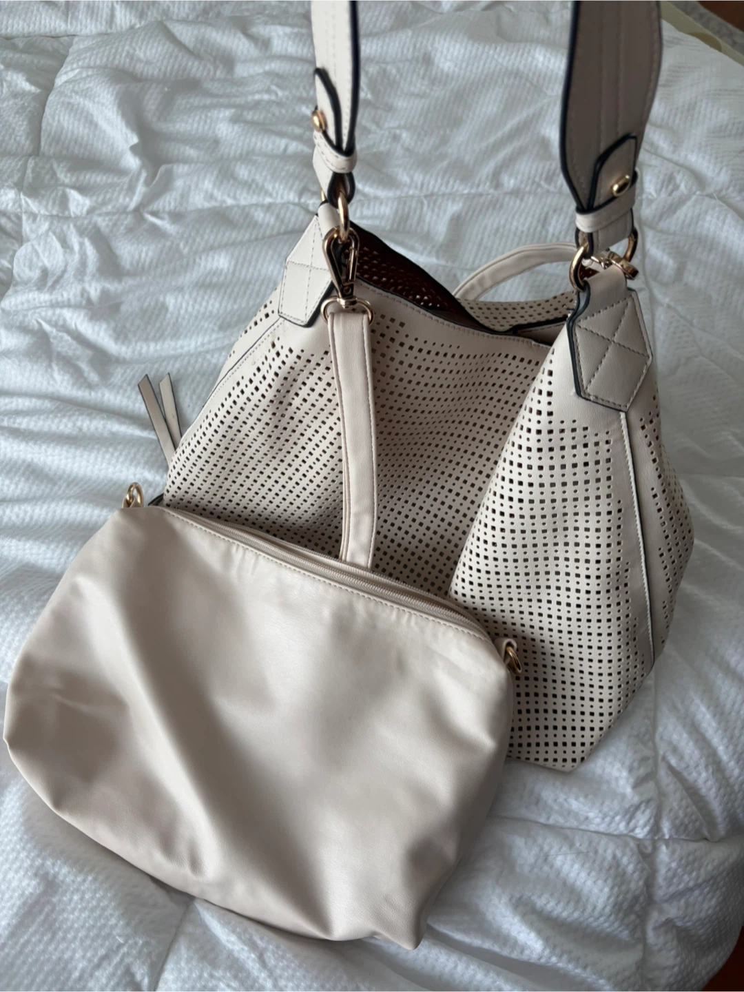 Two piece handbag set in cream colour.