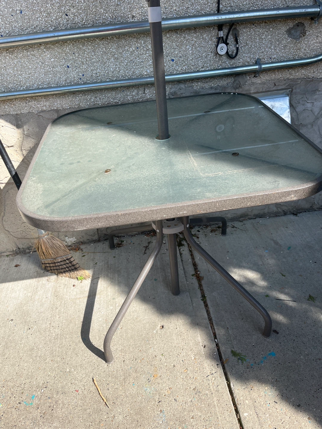 Outdoor patio table with umbrella