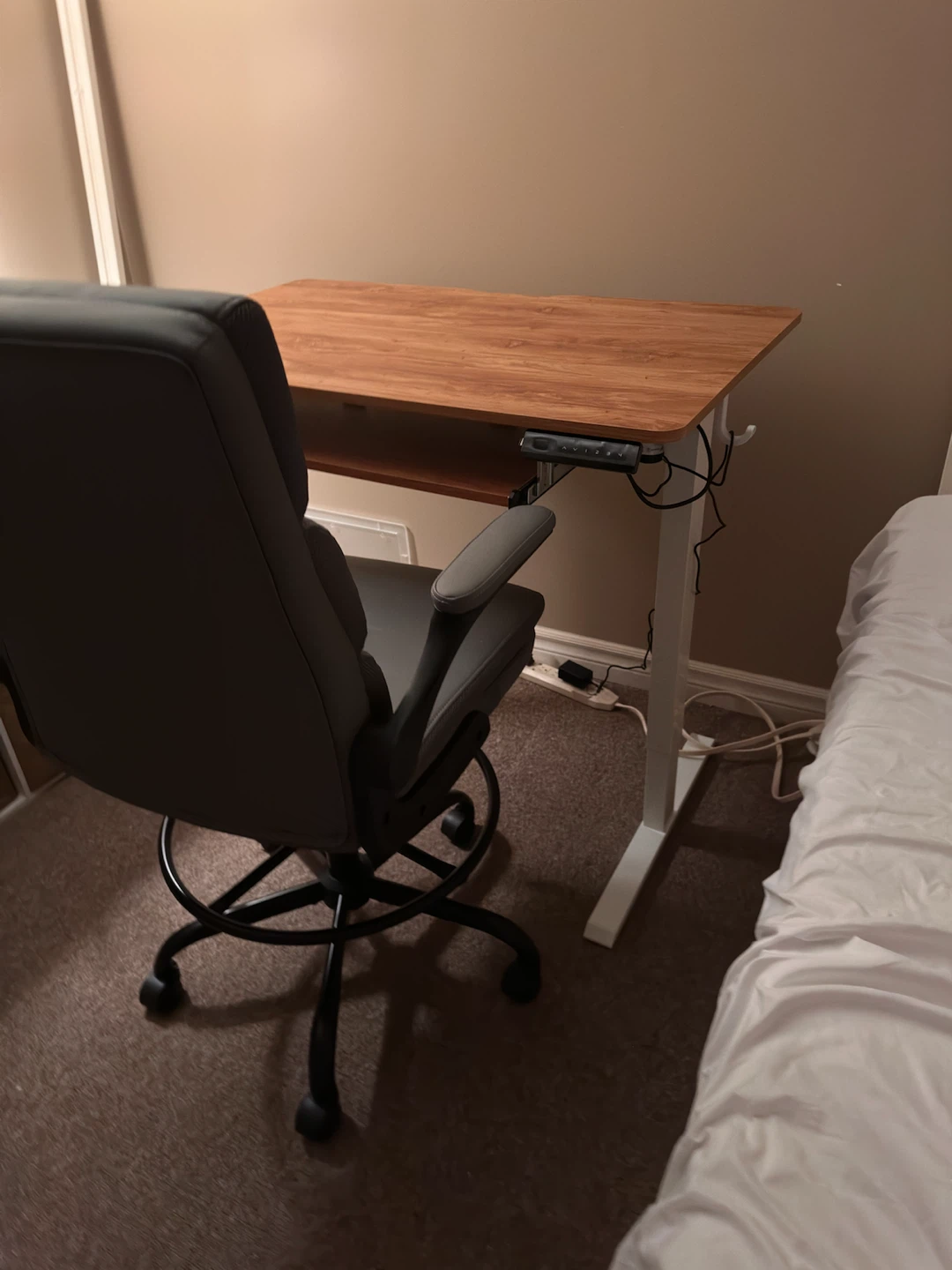 Grey swivel chair, and electric desk - photo 2