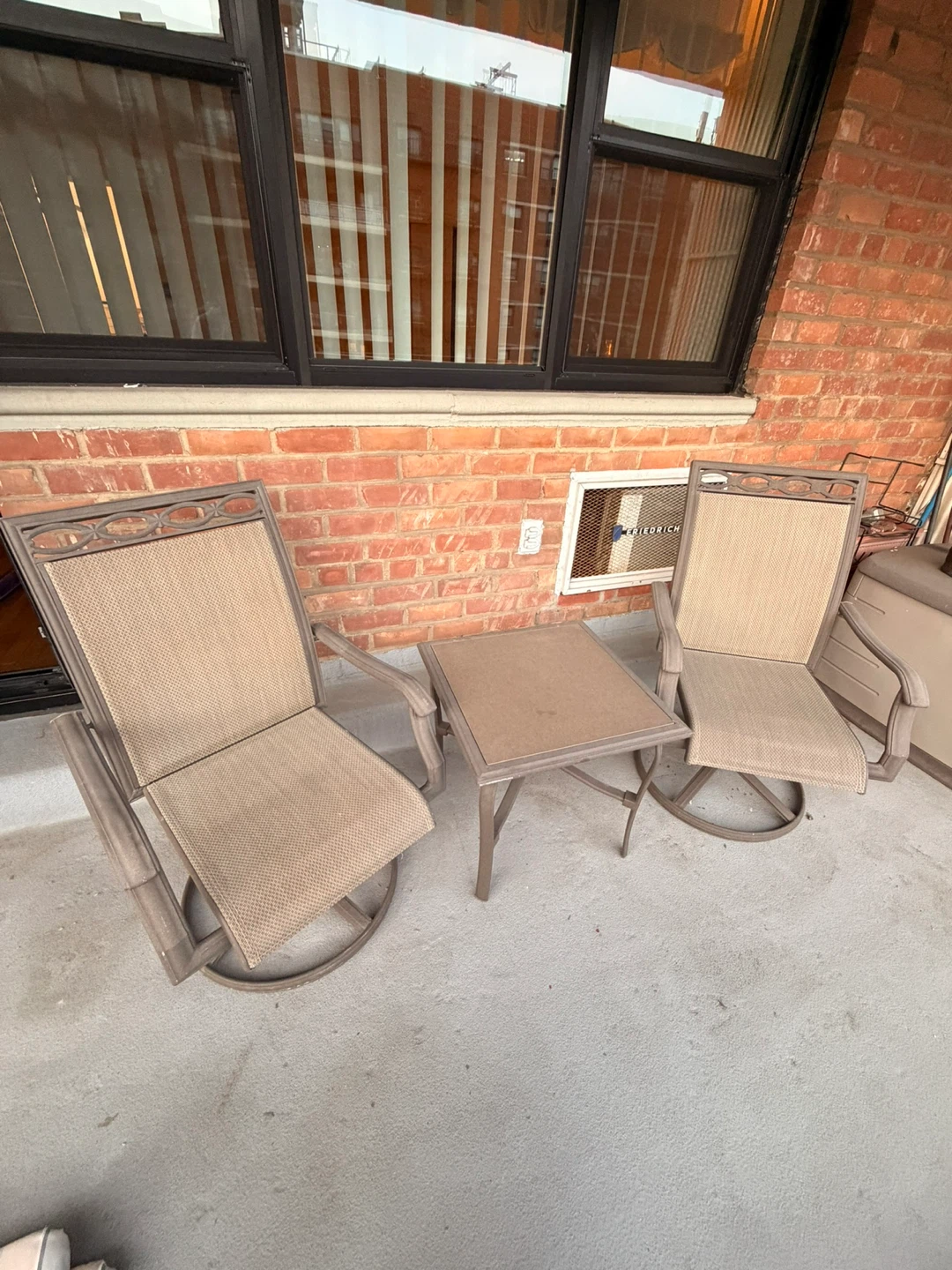 Patio Set with Two Swivel Chairs and Table