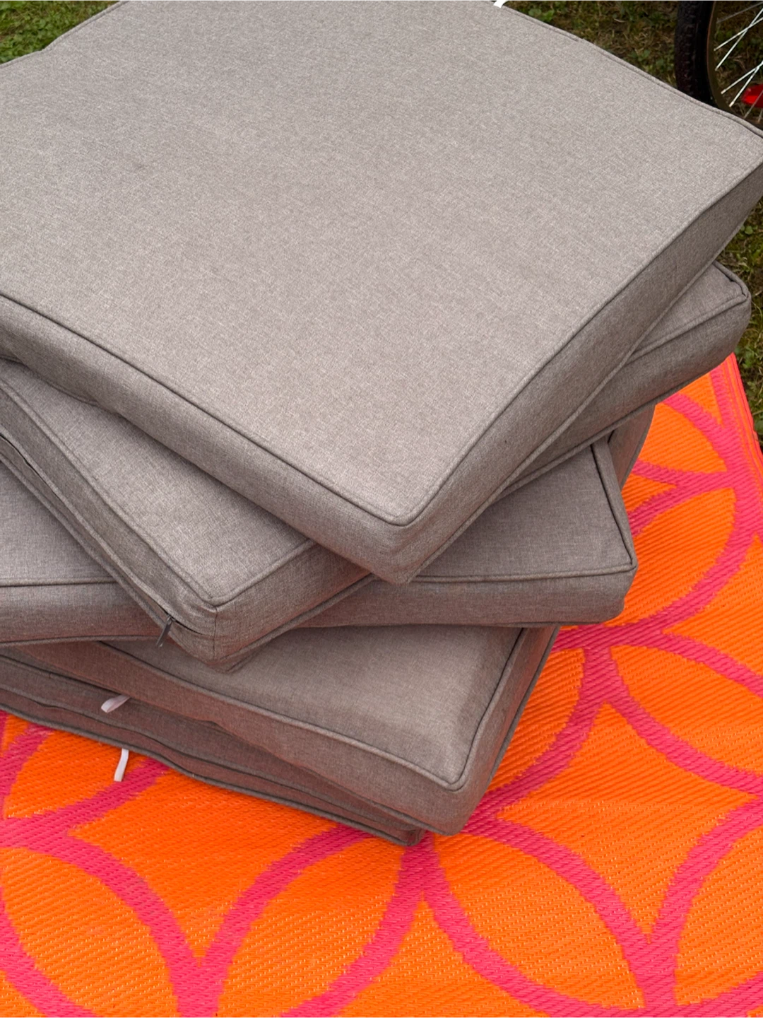 Set of grey outdoor seat cushions