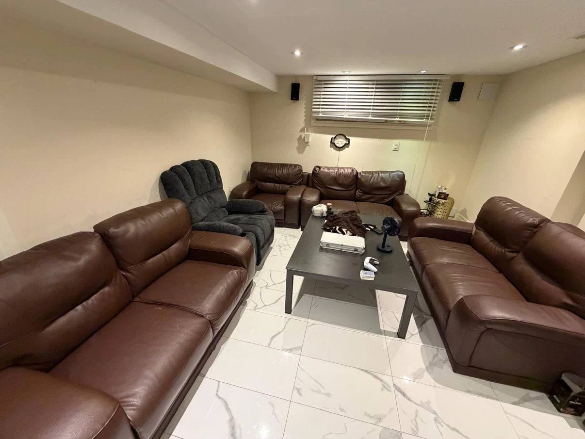 Dark brown leather loveseat