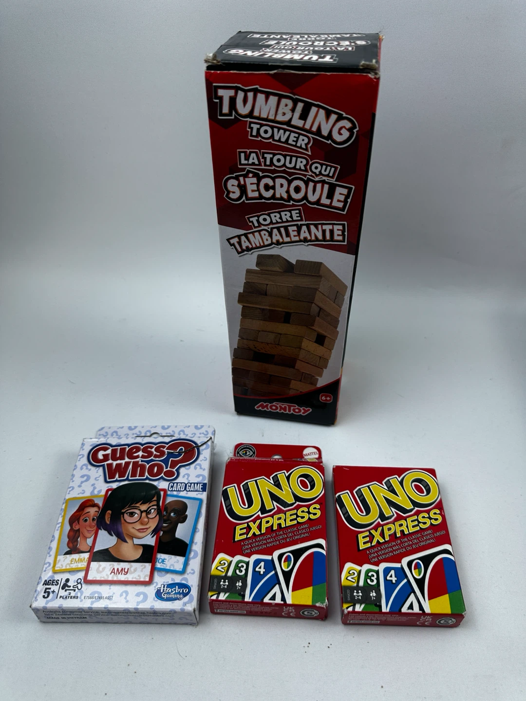 Bundle of Games: Tumbling Tower, Guess Who, and Uno Express