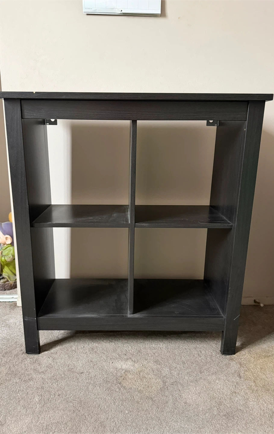 Dark wood shelving unit