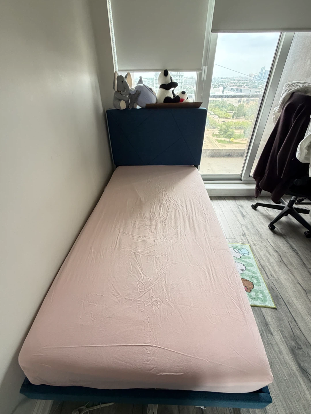 Blue upholstered twin bed frame