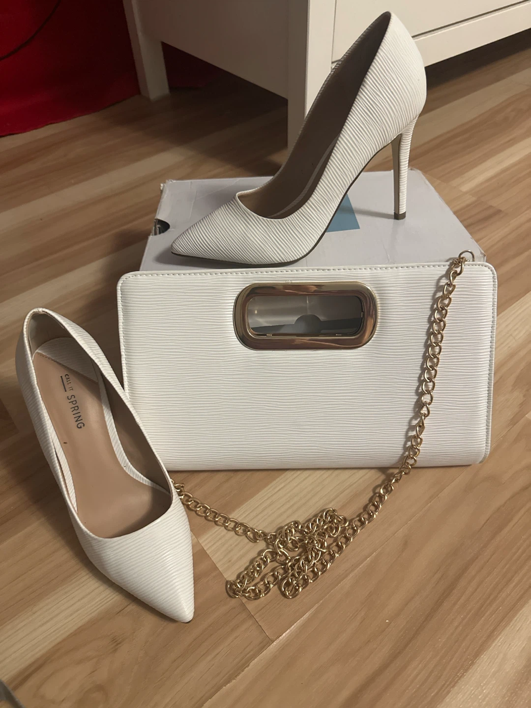 Call It Spring white heels and matching clutch