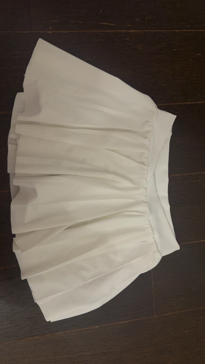 TnaMOVE Tennis V-Waist Micro Pleated Skirt