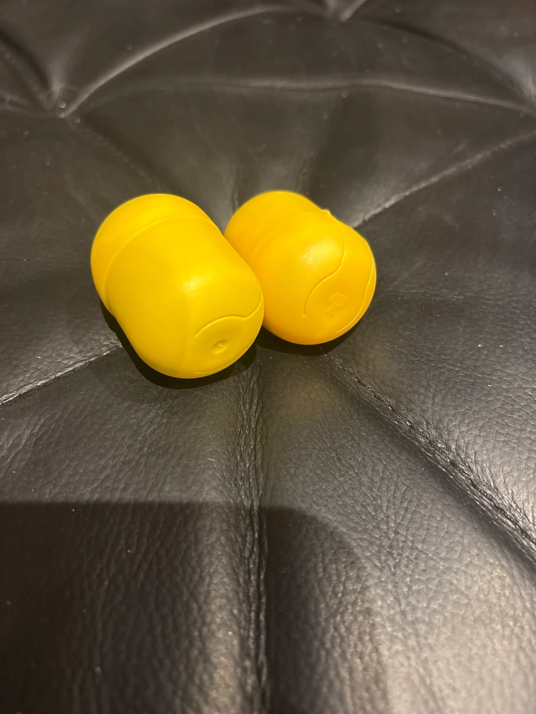 Two yellow Kinder Surprise