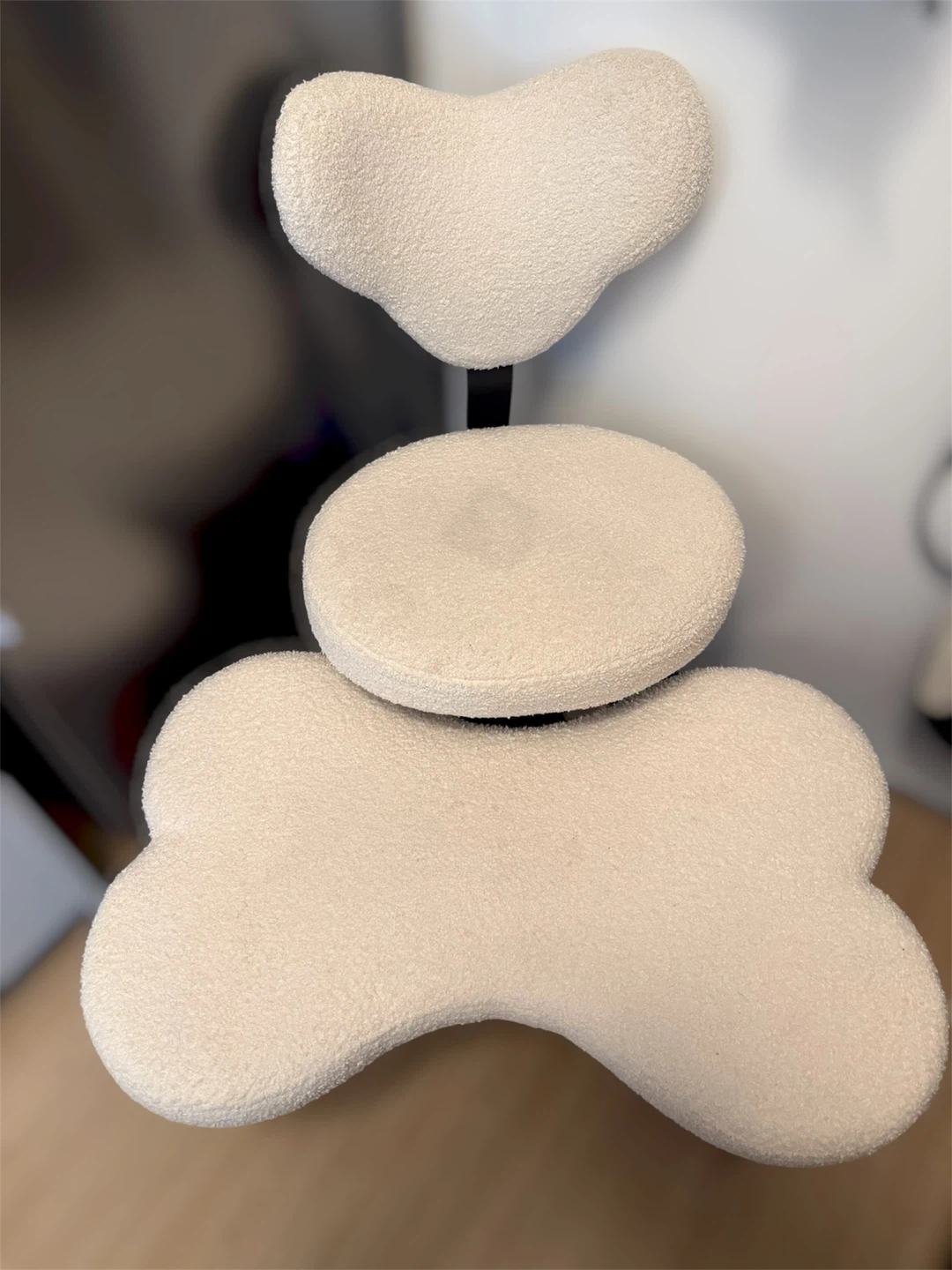 Cream teddy cross-legged swivel chair with footrest