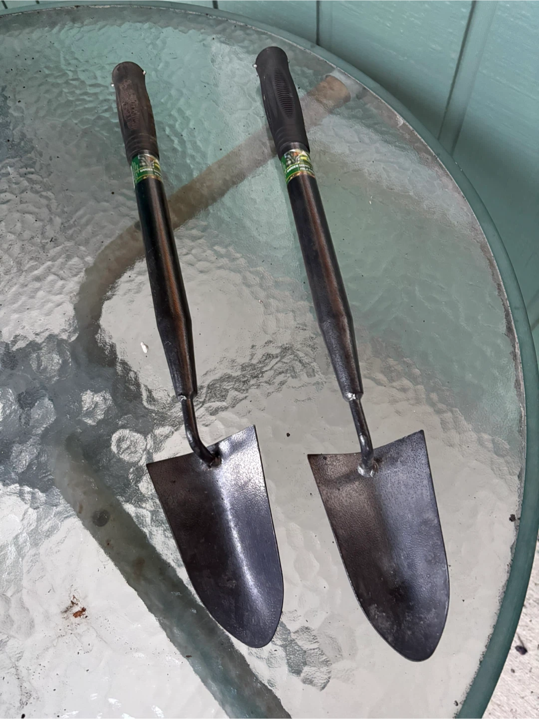 Two garden hand shovels