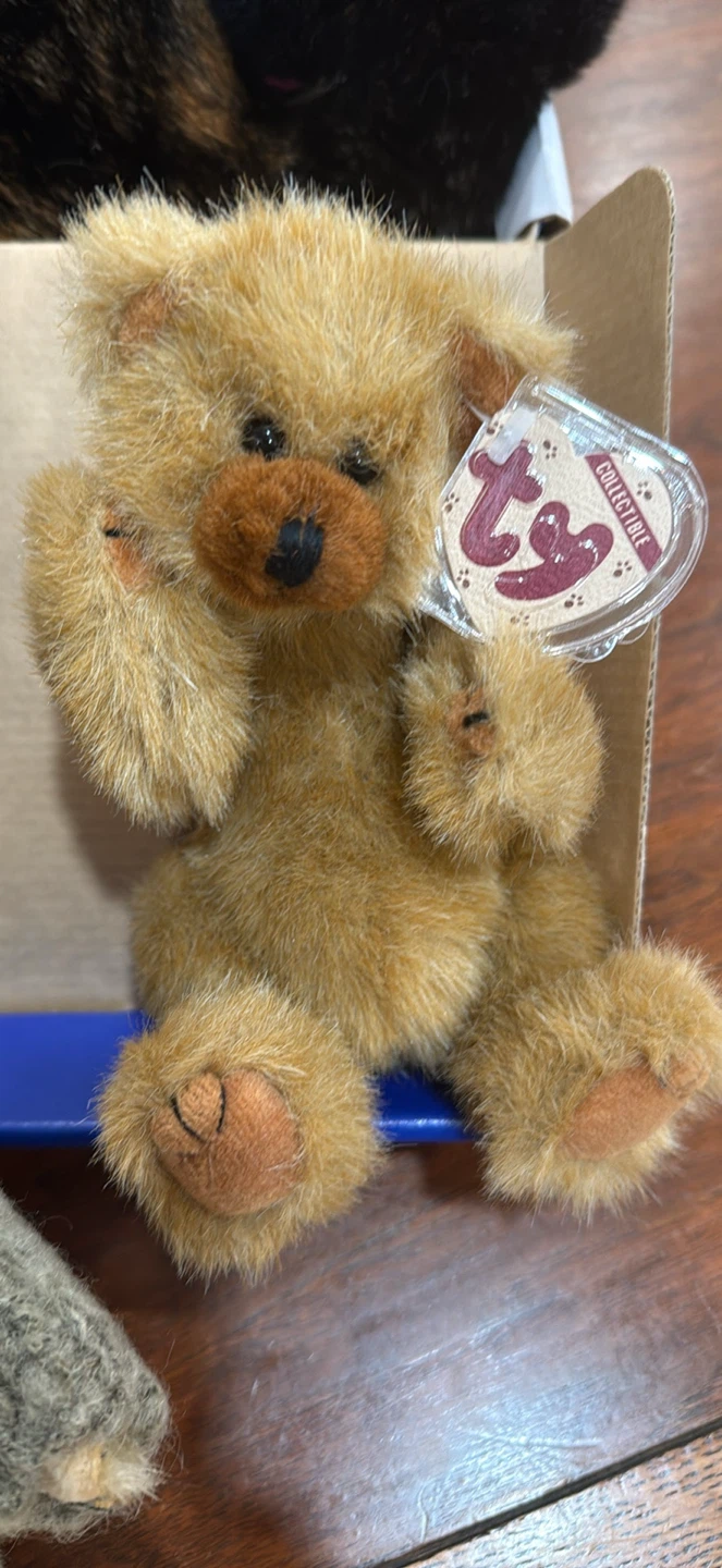 Three Collectible Plush Bears