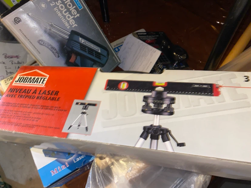 Jobmate Laser Level with Adjustable Tripod in box