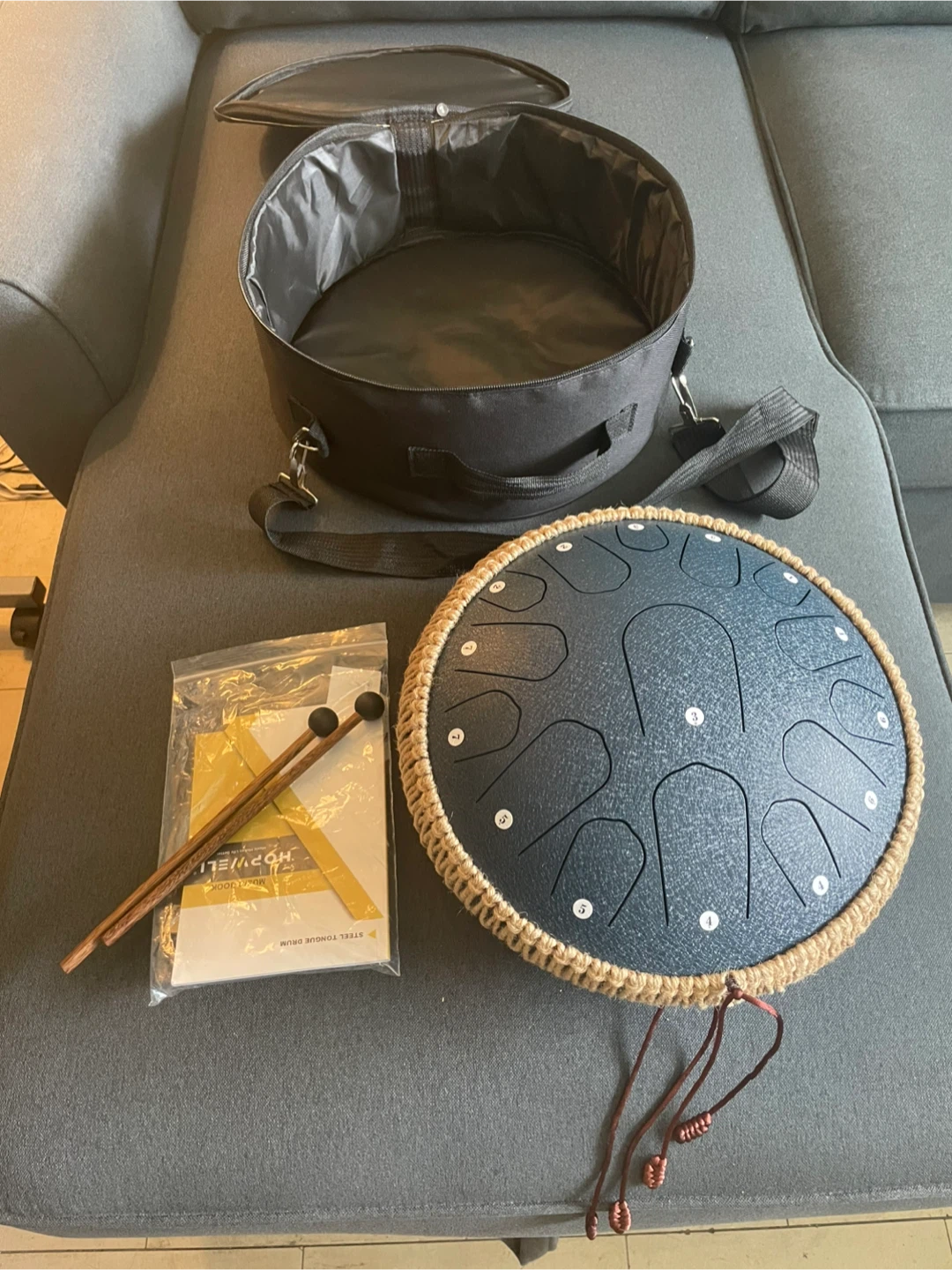 Steel Tongue Drum. Mint. 13" . 15 note. D major. With 2 mallets,