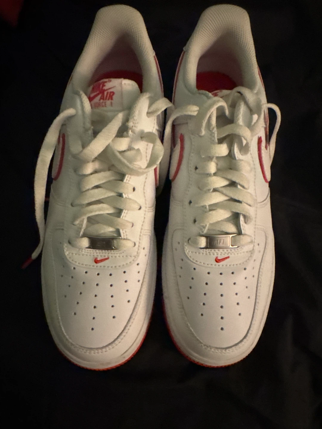 Orange and white air force 1s
