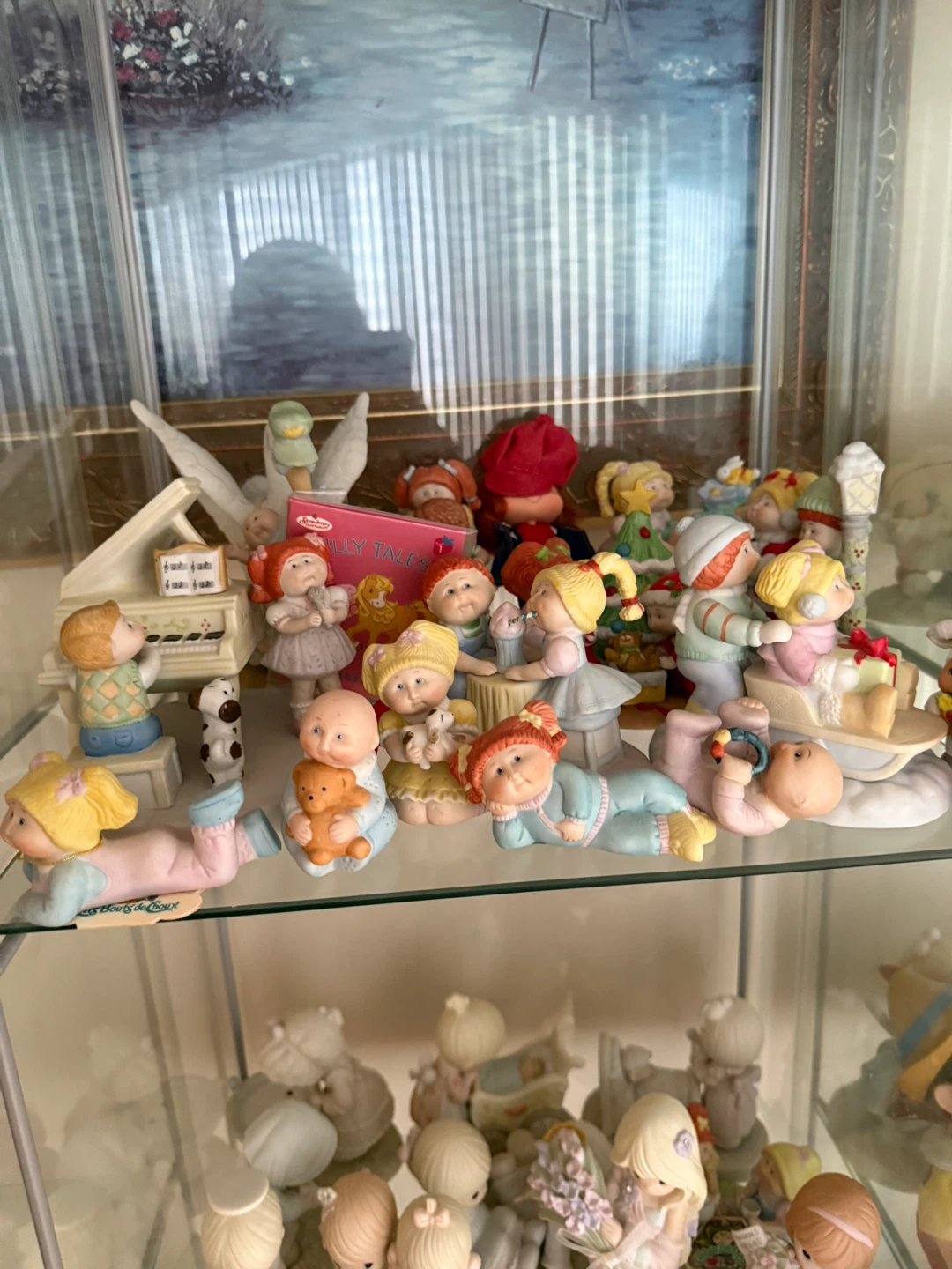 Assorted Precious Moments and Cabbage Patch Kids Figurines
