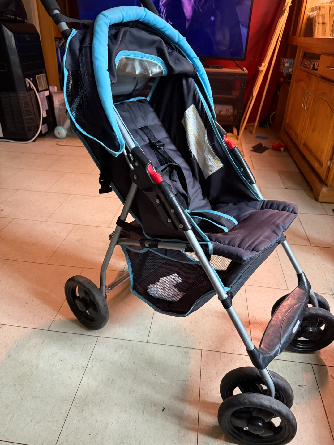 Cosco blue and black stroller