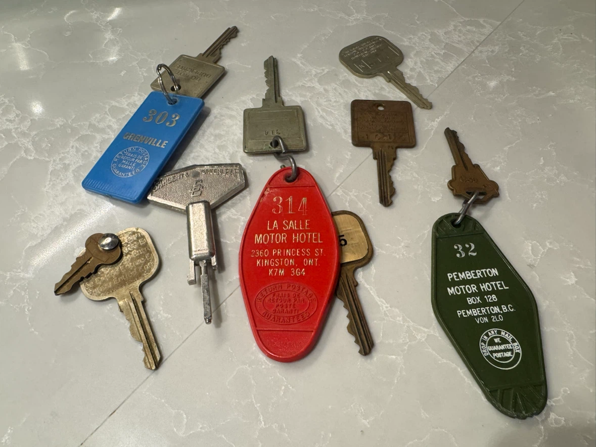 Collection of Vintage Hotel and University Key Tags
