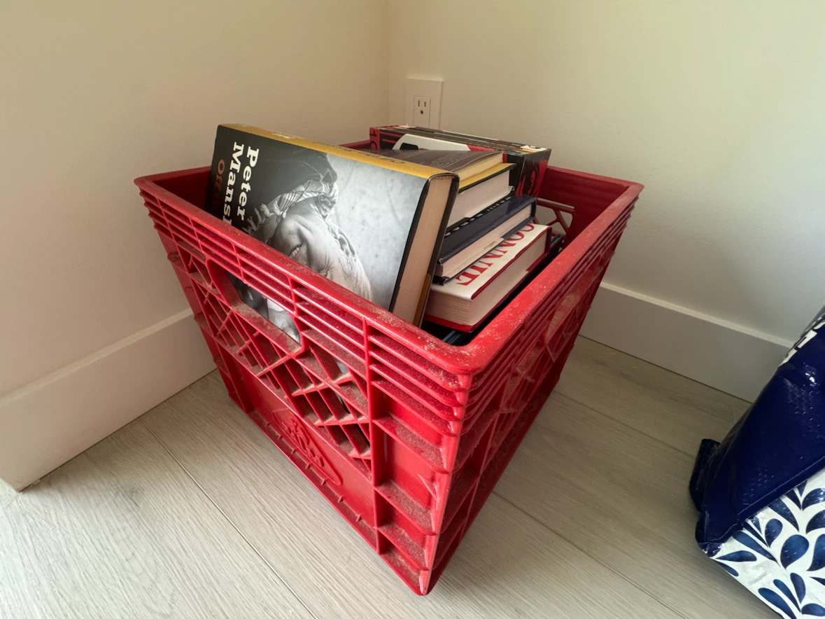 Red plastic milk crate