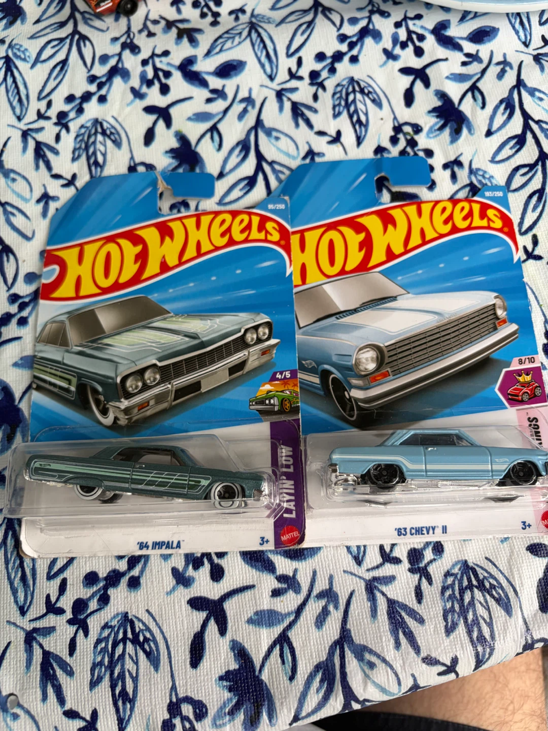 2 Hot Wheels cars: 64 Impala and 63 Chevy II