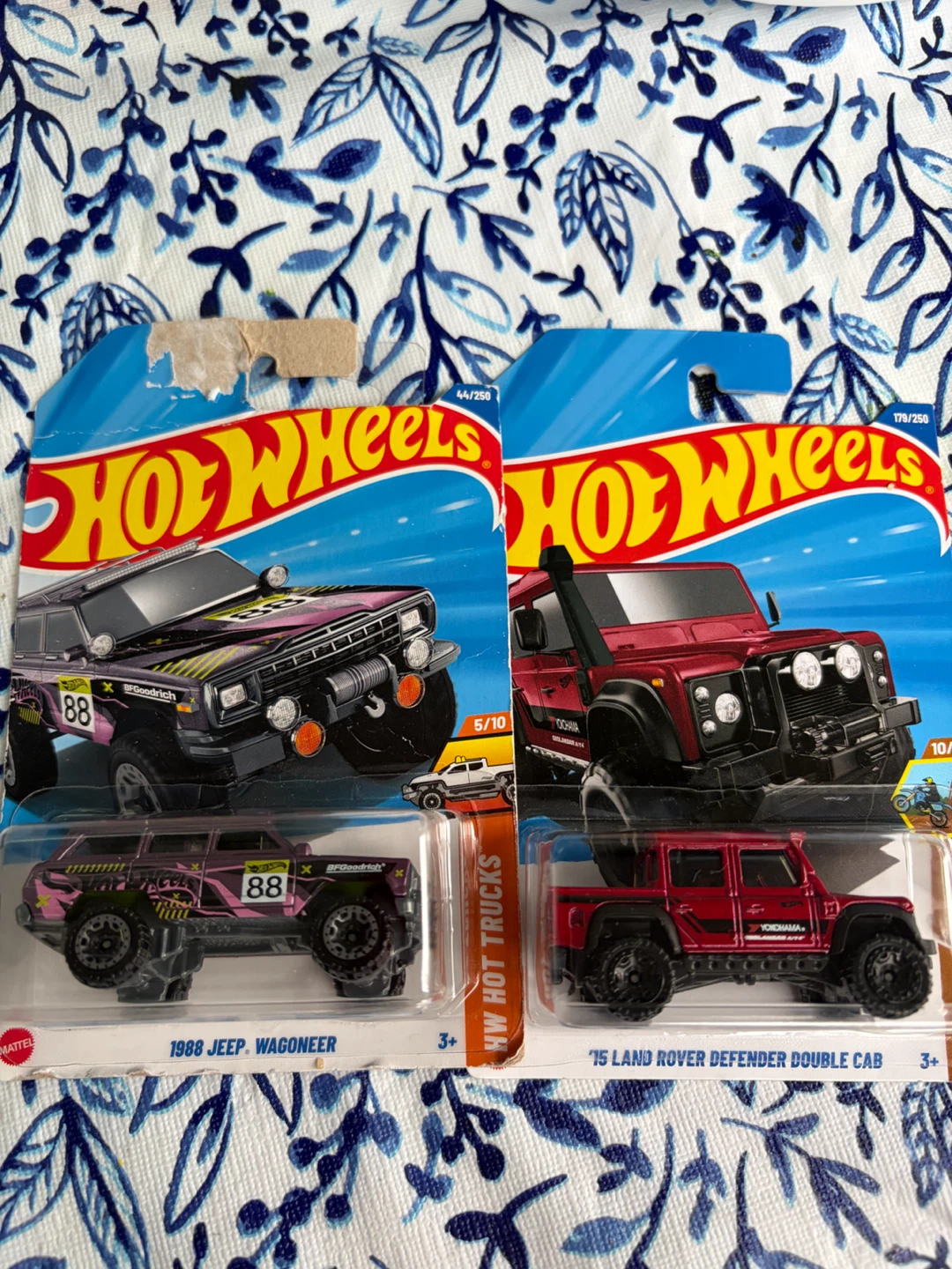 Two Hot Wheels die-cast trucks