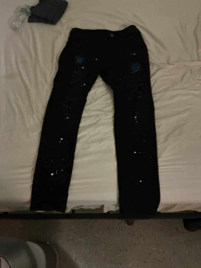 Black paint splatter denim jeans