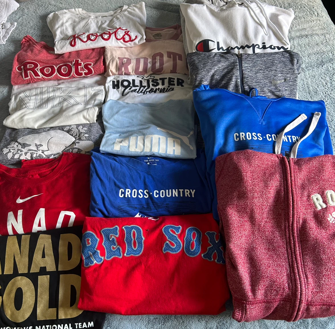 Assorted branded athletic and casual clothing bundle