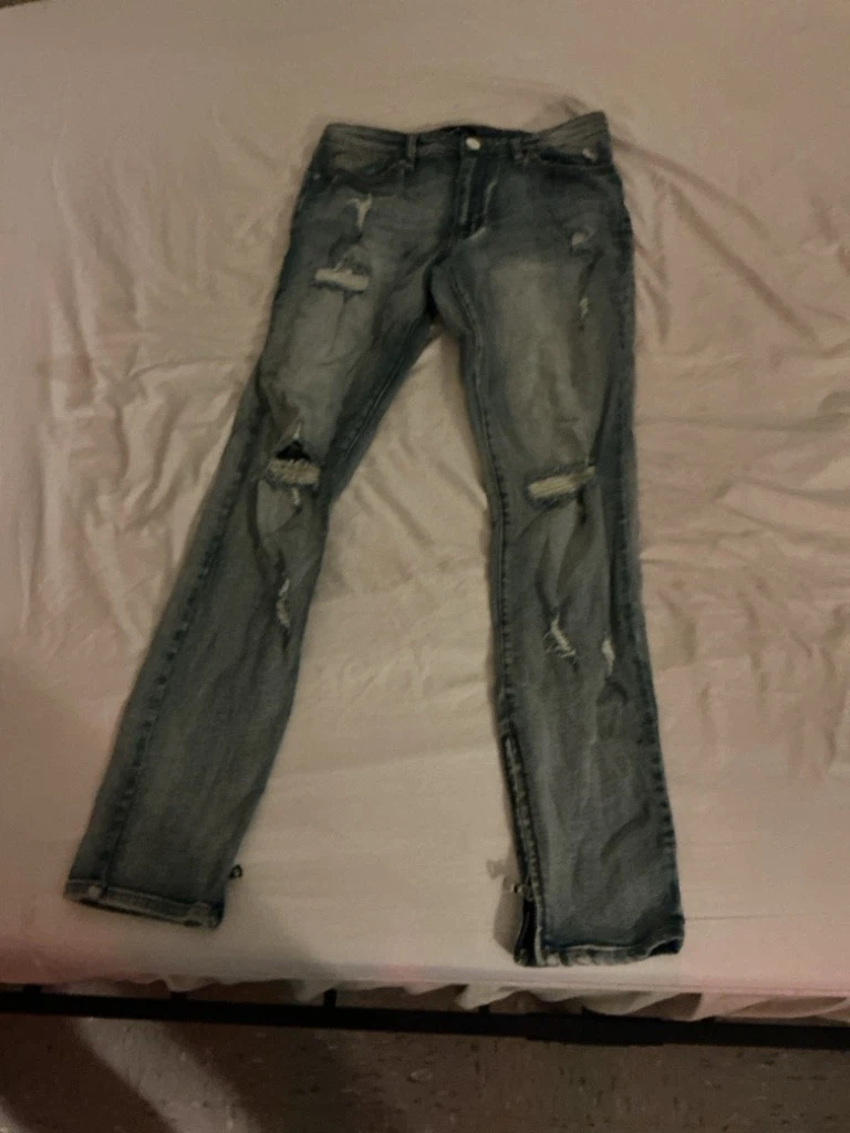 Light wash distressed skinny jeans