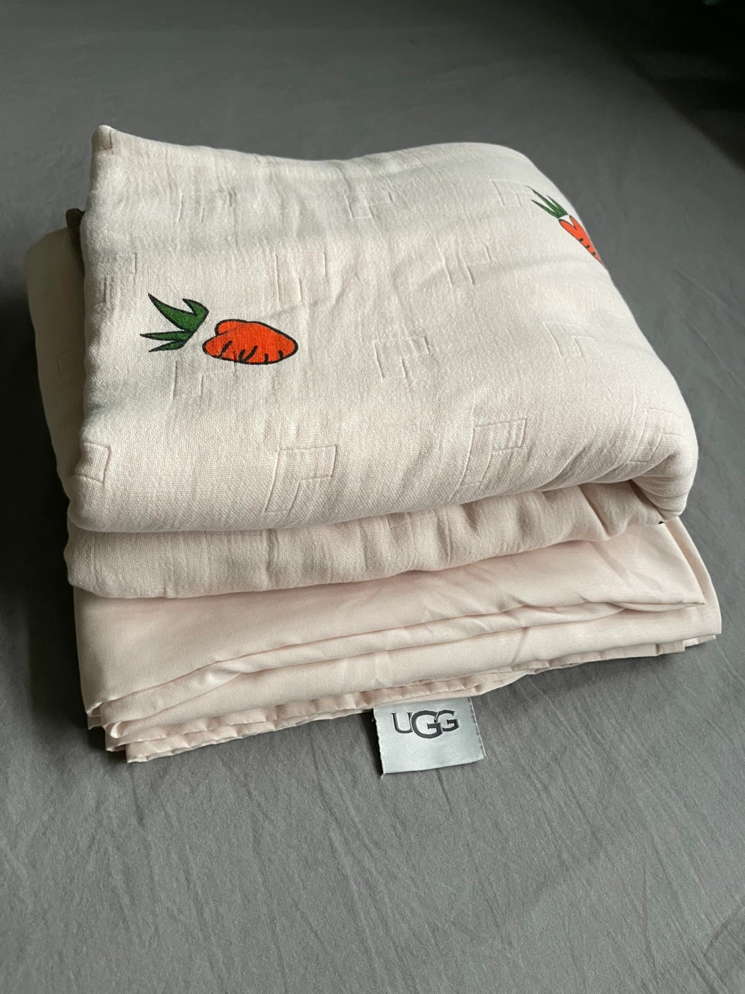 Ei mio home carrot print muslin blanket and UGG bed sheet