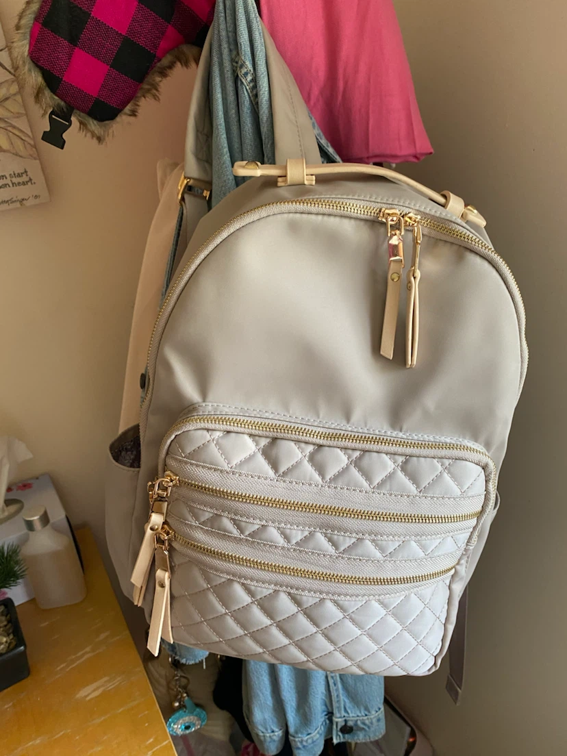Light grey quilted backpack
