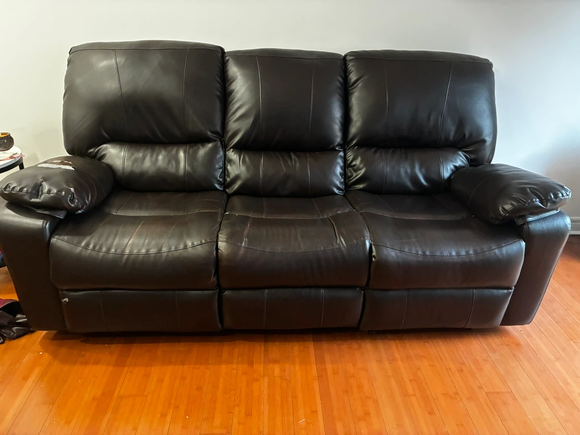 Dark brown leather reclining sofa