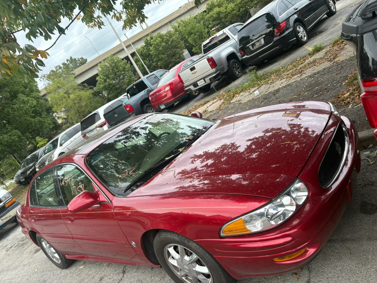 Red Buick LeSabre sedan Limited