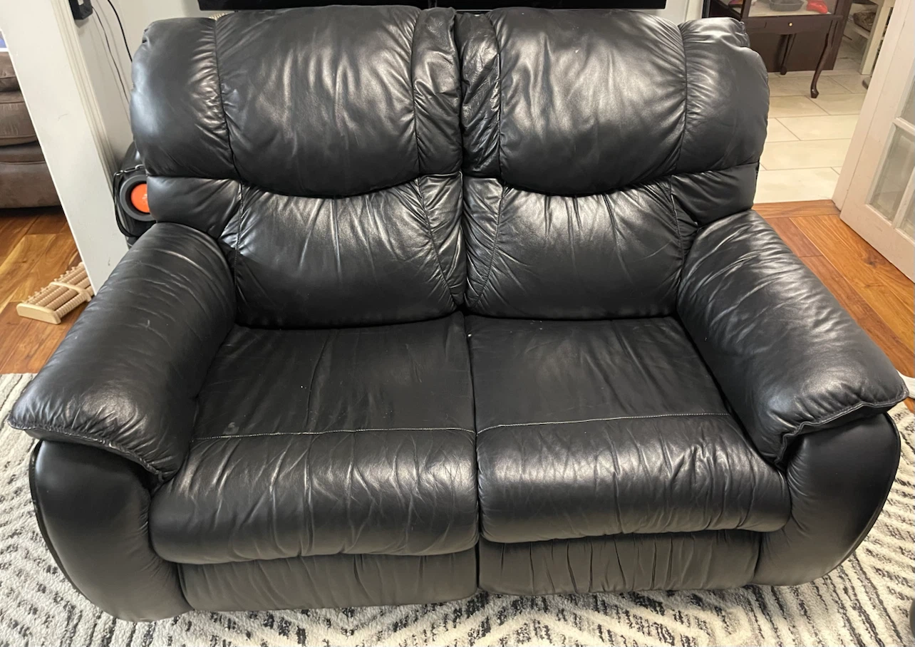 Black Leather Two-Seater Reclining Loveseat + 1 Single Recliner