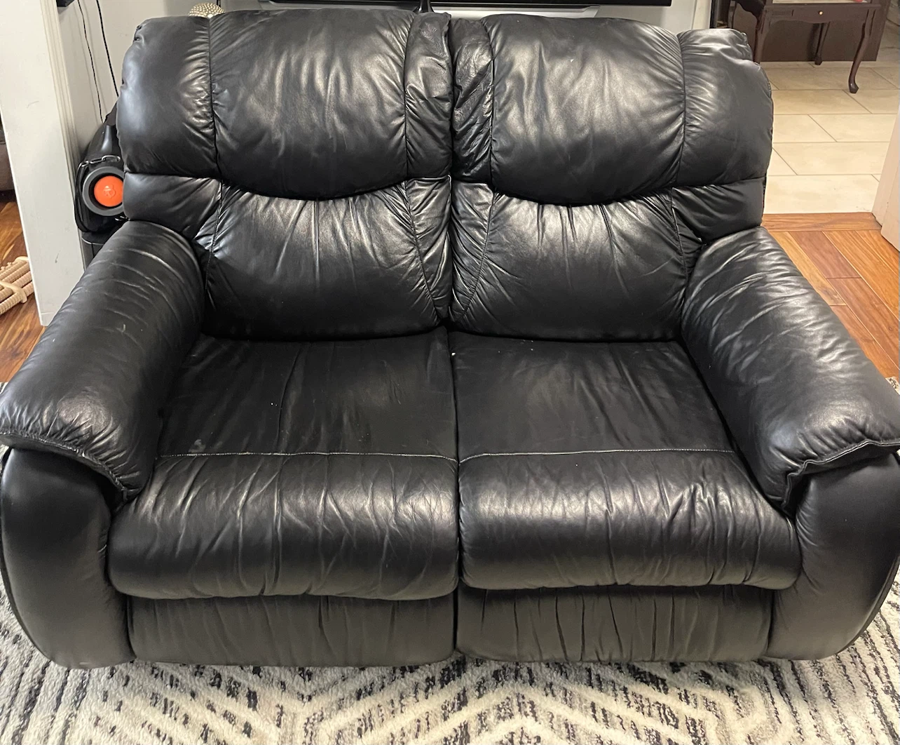Black Leather Two-Seater Reclining Loveseat + 1 Single Recliner - photo 2