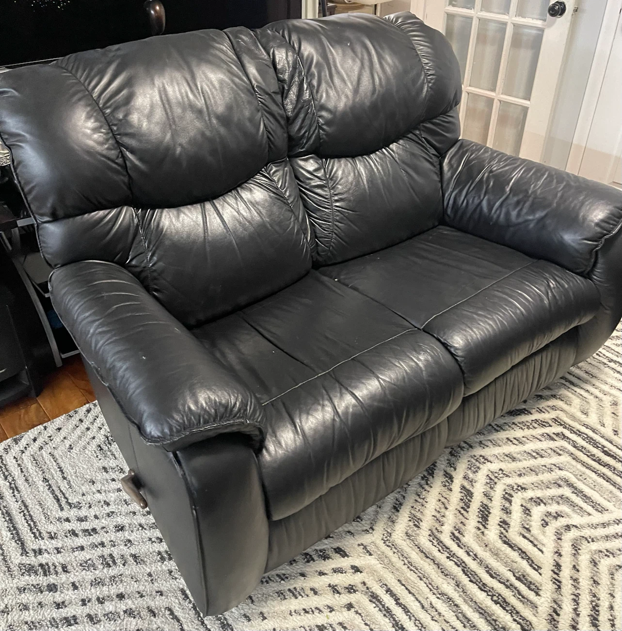 Black Leather Two-Seater Reclining Loveseat + 1 Single Recliner - photo 3