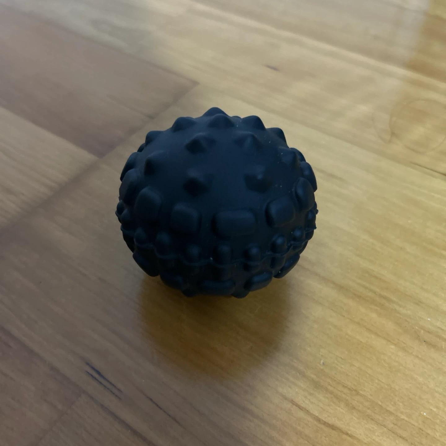 Black spiky massage ball