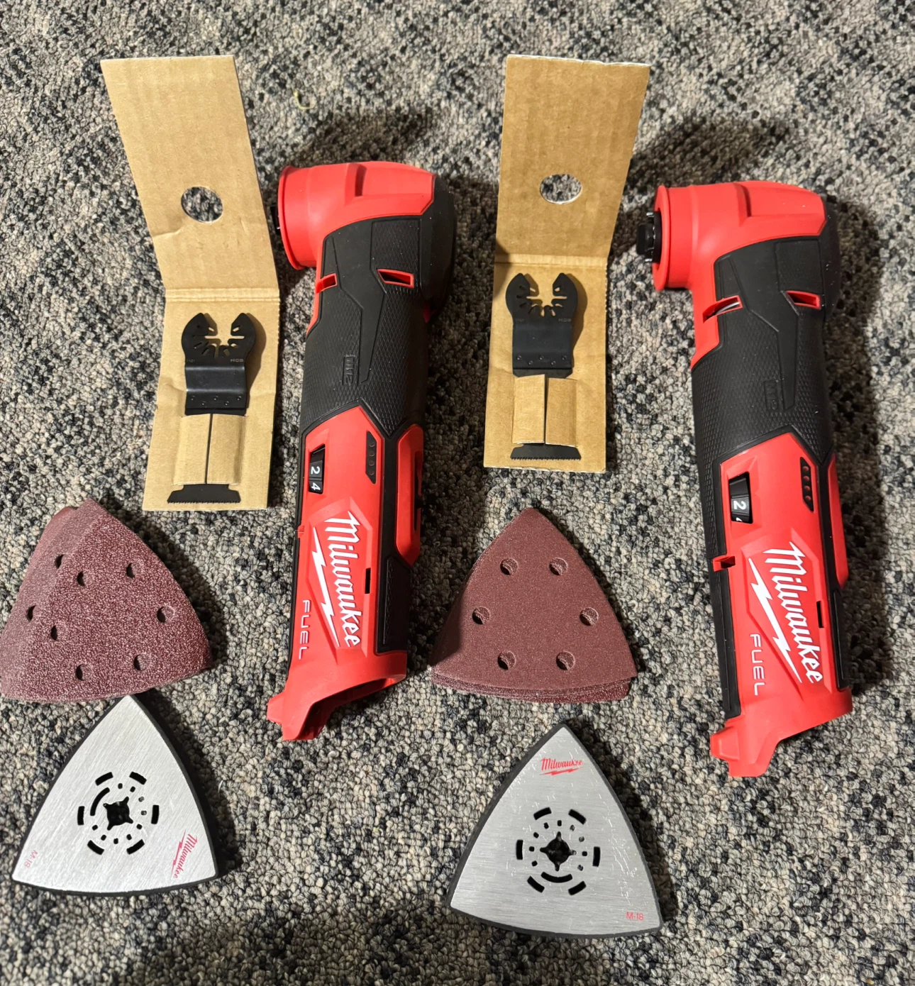 Two Milwaukee M12 FUEL Multi-Tool Units with Accessories