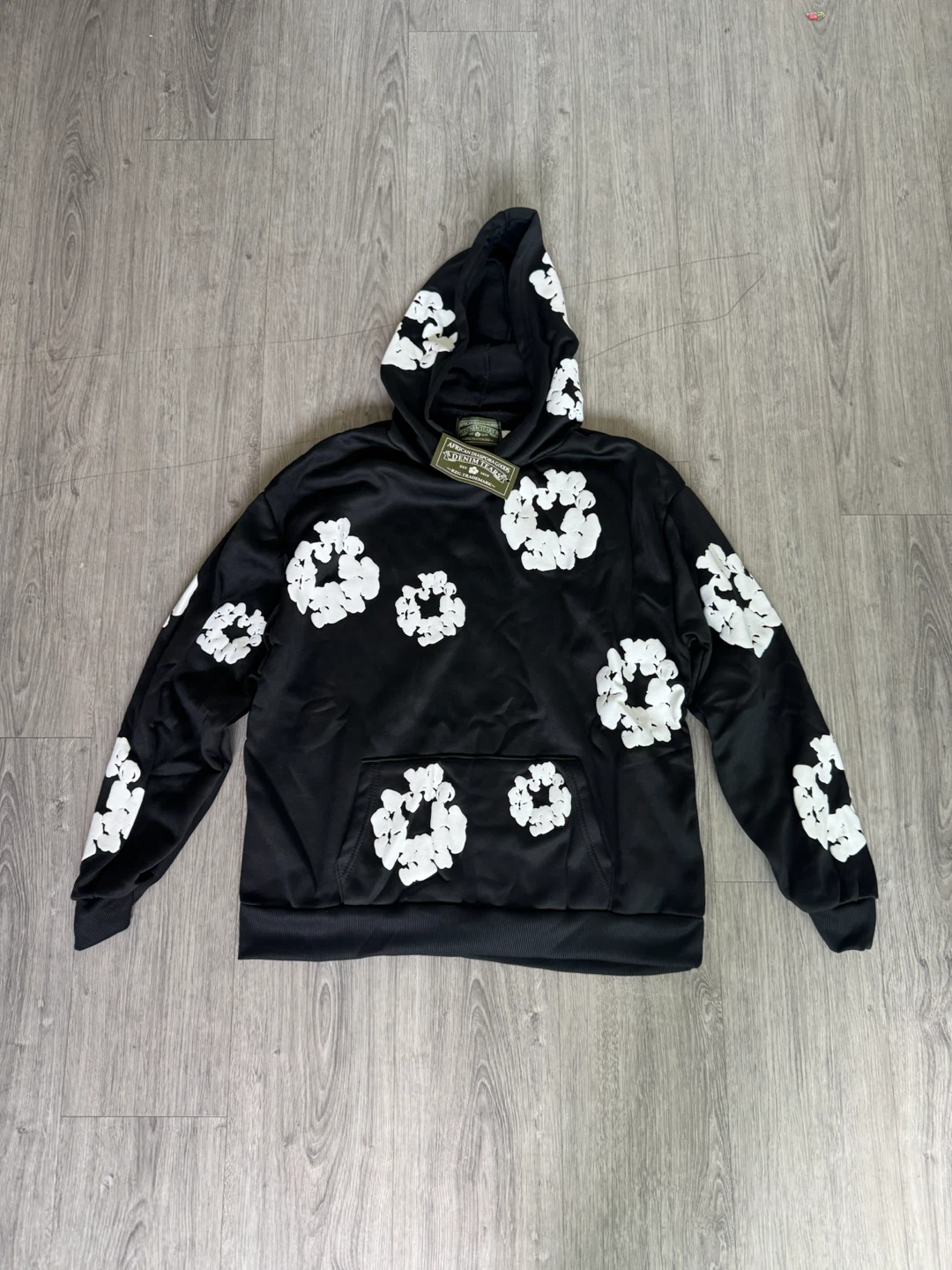 Denim Tears Black Hoodie with Floral Design