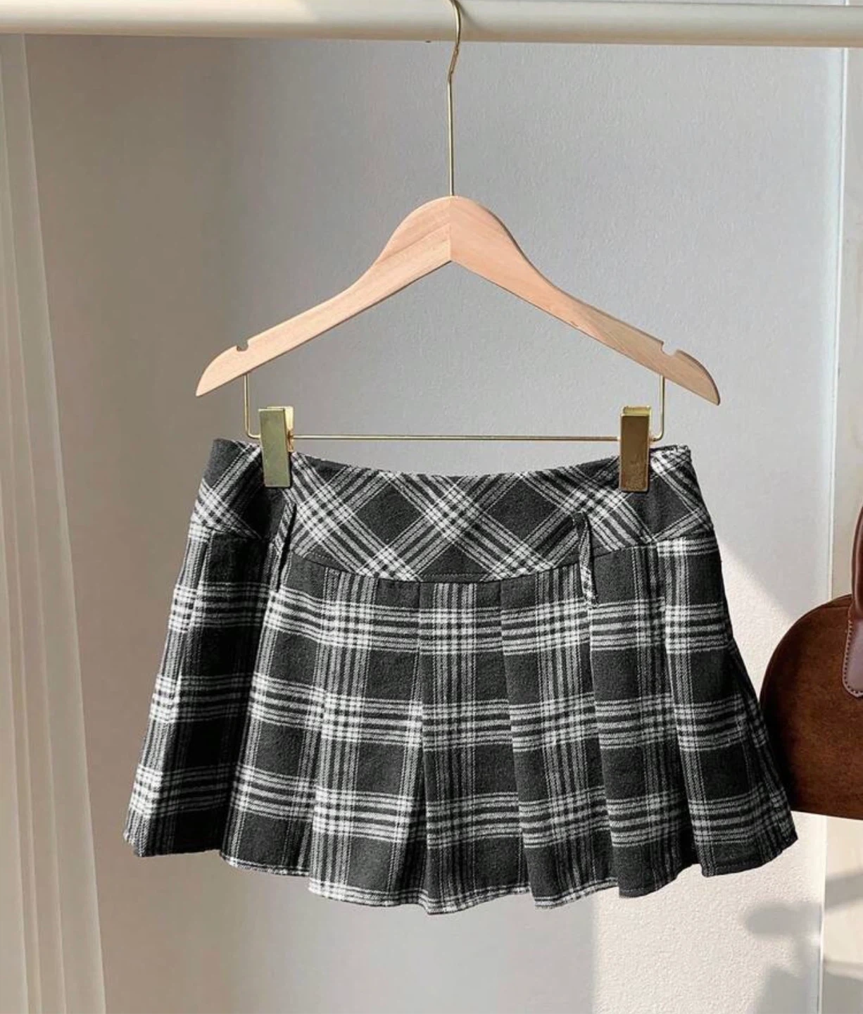 Black and white plaid pleated mini skirt