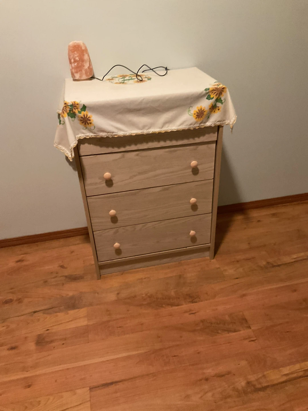 Three-drawer wooden dresser