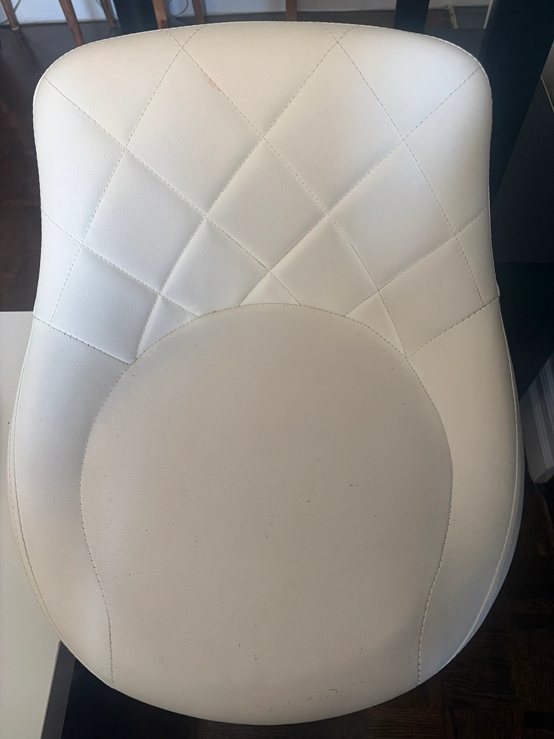 White faux leather swivel chair
