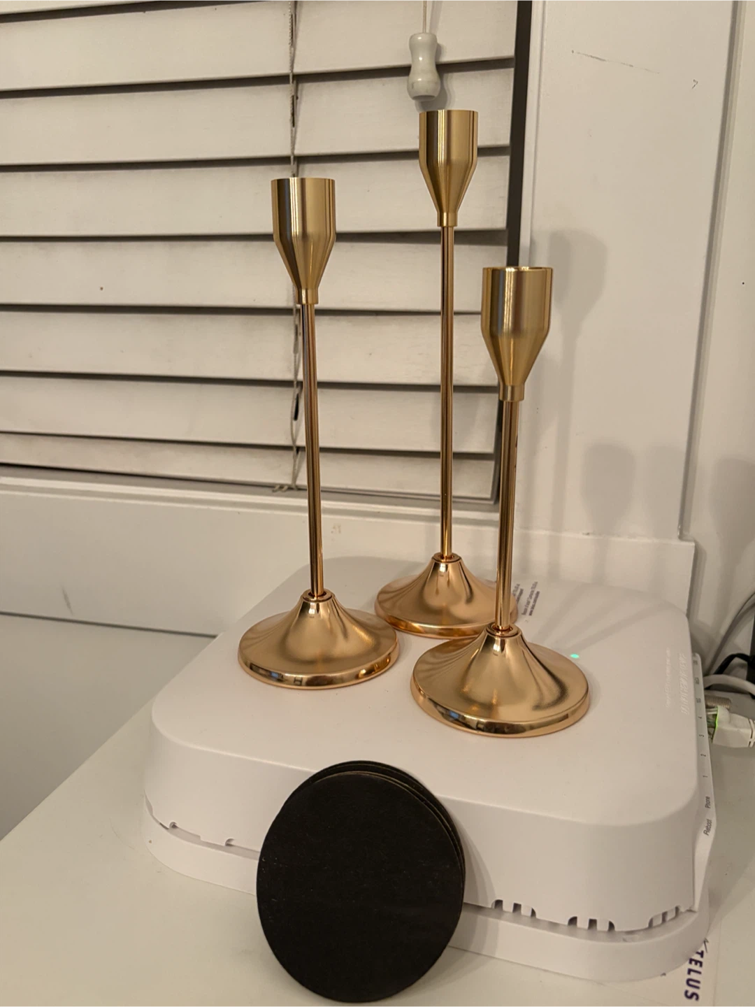 Set of 3 gold tone candle holders
