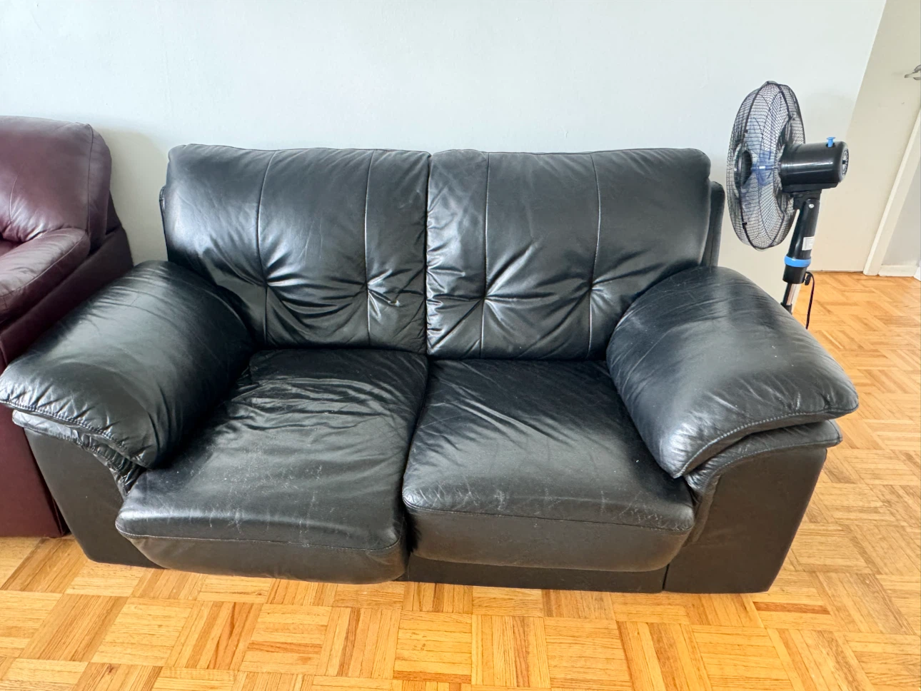 Black Leather Two-Seater Loveseat