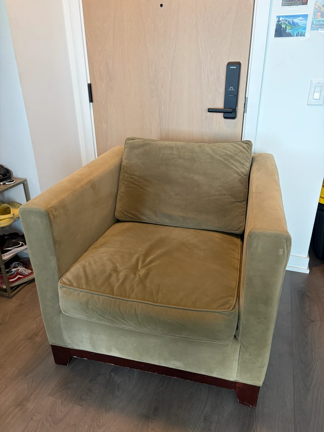 Olive green velvet armchair